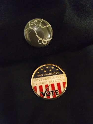 Image: My pollworker pin. Still wearing it because the election drama is ongoing...