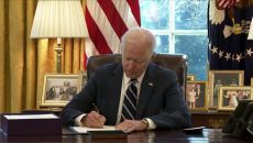 The President signing the bill. WhiteHouse.gov...