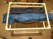 The dry-fit frame's rack with camp chair and mockup camp table...