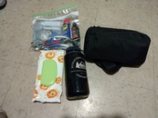 The bike tools, spare parts, a few road wipes and nalgene pee bottle easily fits in one of the trunk bag panniers...