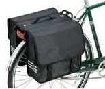 Strictly looking locally, I fell back to the Public Bikes Professional Panniers - waterproof, 25L capacity. Not cheap, but a third the price of full rear panniers...