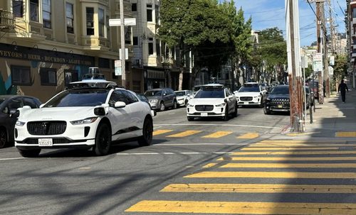 Robo Taxis rolling through the Mission. Photo by Lydia Chavez, missionlocal.org...