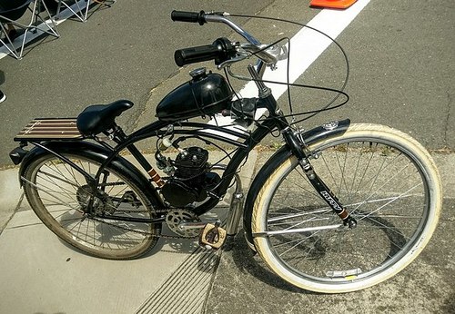 A Huffy bicycle converted with a bolt-on engine and gasoline tank. Image by Jim Heaphy, Wikipedia...
