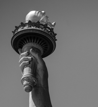 Lady Liberty's raised fist of resistance...