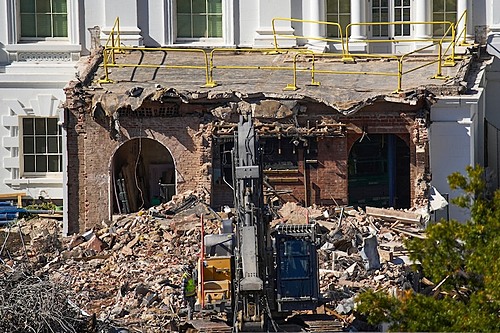 Image: Jacquelyn Martin/AP. Debris is seen at a largely demolished part of the East Wing of the White House, Oct. 23, 2025...
