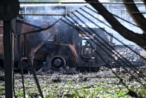 View of a destroyed truck at La Carlota air base in Caracas on January 3, 2026. Image: Juan Barreto / AFP...