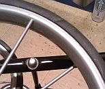 Image: The weakest part of the $20 granny cart, wheels with plastic spokes. I doubt these would carry more than 50 lbs...