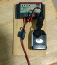 Positioning the charge controller and the power inverter for mounting...